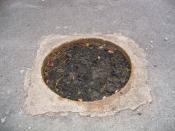 Seltsame runde Einbuchtung im Asphalt unter dem Aussichtsturm / strange round indentation in the tar below the view tower
