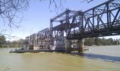 paddle steamer under the bridge