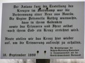 Beispiel: Schild neben dem Kreuz